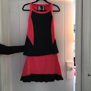 pink and black matching tennis skirt and top